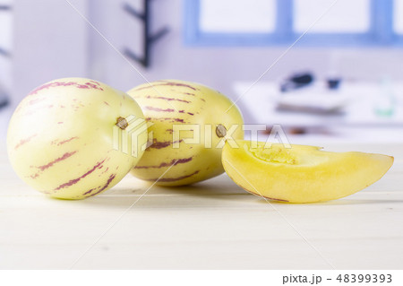 Fresh striped pepino melon with blue window 48399393
