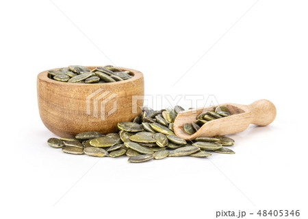 Hulled pumpkin seeds isolated on white 48405346
