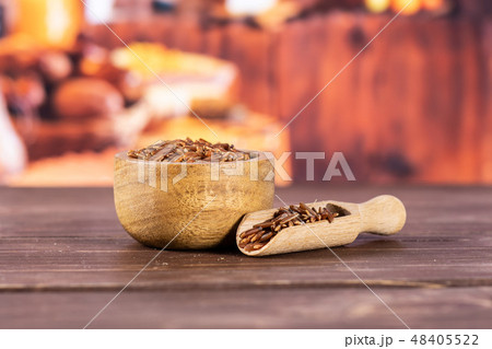 Raw red rice with rustic kitchen Raw red rice with rustic kitchen 48405522