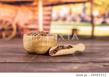 Raw red rice with cart Raw red rice with cart 48405531