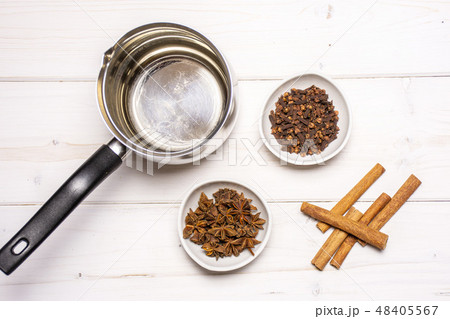 Recipe step by step hot red mulled wine grey wood 48405567