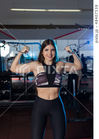 Very beautiful girl trains hands on blocks in the Very beautiful girl trains hands on blocks in the 48407539