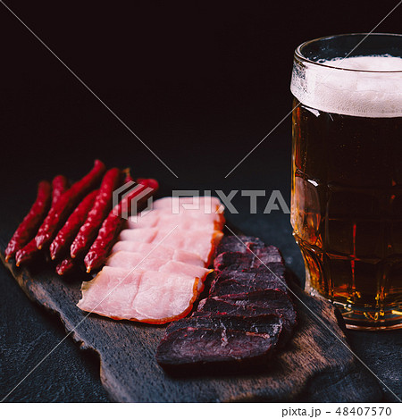 craft lager beer and meat snacks set. bar table craft lager beer and meat snacks set. bar table 48407570