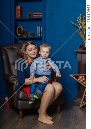 Portrait of happy mother and adorable baby 48410943