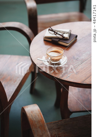 Coffee cup on rustic wood table Coffee cup on rustic wood table 48417141