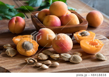 Fresh ripe apricots on a wooden table Fresh ripe apricots on a wooden table 48418838