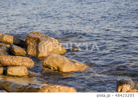 Sea waves are fighting against the big rocks on Sea waves are fighting against the big rocks on 48423205