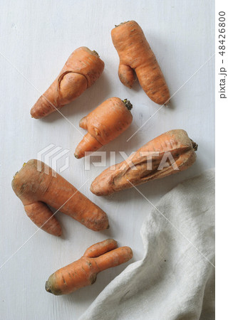 Some ugly carrots of a harvest Some ugly carrots of a harvest 48426800