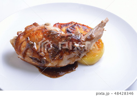 Sous Vide rabbit leg with sous and grilled apple  48428346