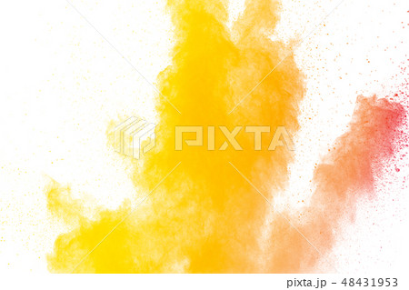 Abstract yellow orange powder explosion on white. 48431953