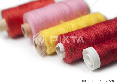 sewing thread spool bobbins on white background sewing thread spool bobbins on white background 48432976