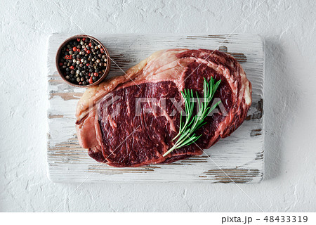 Marbling ribeye steak on white plate 48433319
