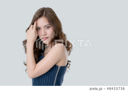 attractive elegance asian woman in blue dress attractive elegance asian woman in blue dress 48433736
