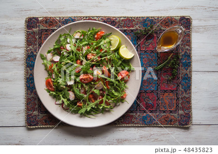 Asian salad with quinoa and arugula. Top view. 48435823