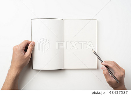 man hand hold brown notebook and pen on white 48437587