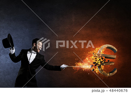 Man magician with cylinder hat 48440676
