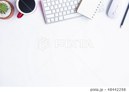 White desk office with laptop, smartphone and othe White desk office with laptop, smartphone and othe 48442298