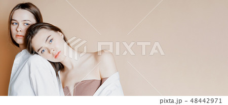 Fashion beauty models two sisters twins beautiful 48442971