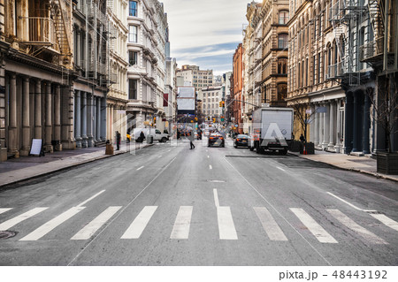 New York City asphalt road on busy intersection New York City asphalt road on busy intersection 48443192