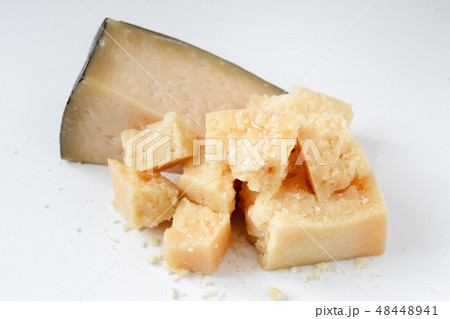 Pieces of Italian Parmesan on a white background 48448941