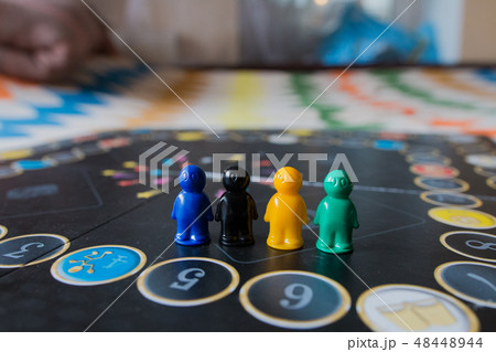 Multi-colored chips for tabletop game in the form 48448944