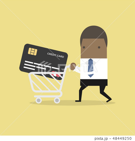 Businessman with credit card in shopping cart. 48449250