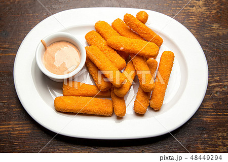 cheese sticks with sauce cheese sticks with sauce 48449294
