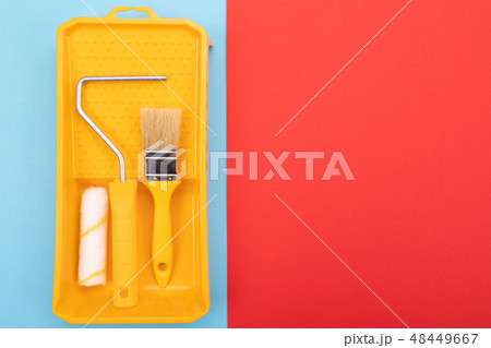 Paint tools. Paint brush and roller with tray for paint 48449667