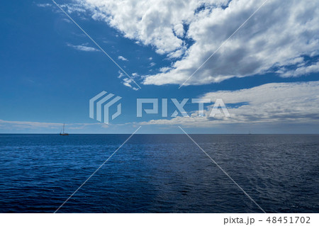 Empty Blue Ocean and Blue Sky Empty Blue Ocean and Blue Sky 48451702