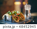 Two fresh tacos on the table 48452945