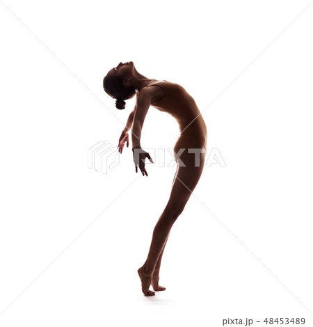 young beautiful dancer in beige swimsuit posing 48453489