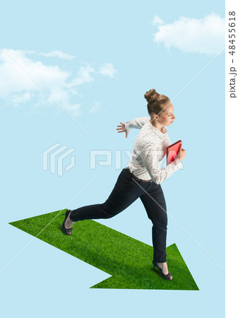 Businesswoman holding laptop walking on graphic stair, start up business concepts. 48455618