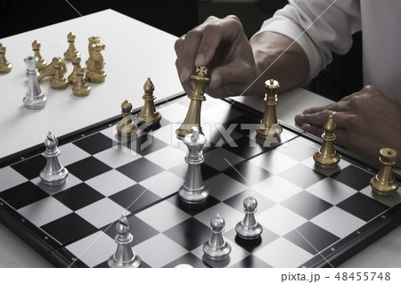 Businessman playing chess game, business strategy 48455748