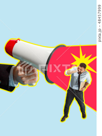Business man screaming with a megaphone 48457999