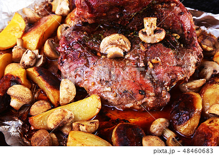 Grilled pork meat with potatoes. barbecue. Selective focus. Grilled pork meat with potatoes. barbecue. Selective focus. 48460683