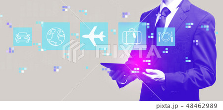 Airplane travel theme with businessman holding a tablet 48462989