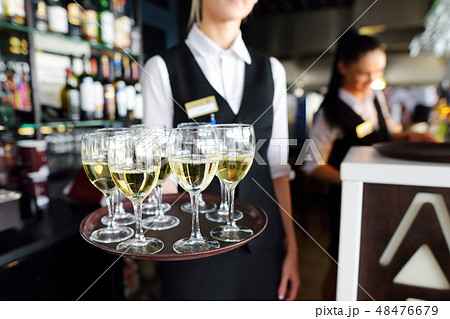 Two sisters and their young mother wrapping gifts 48476679