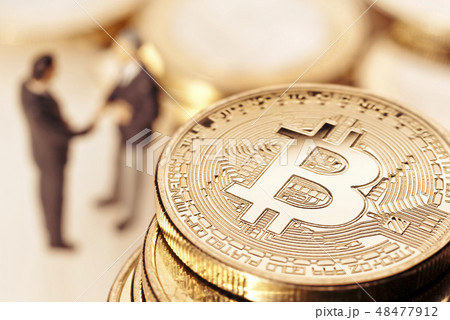 Bitcoin and businessmen 48477912