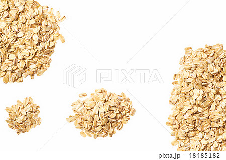 Oat flakes isolated on white background top view Oat flakes isolated on white background top view 48485182