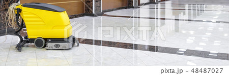 Cleaning machine on luxury shiny floor 48487027