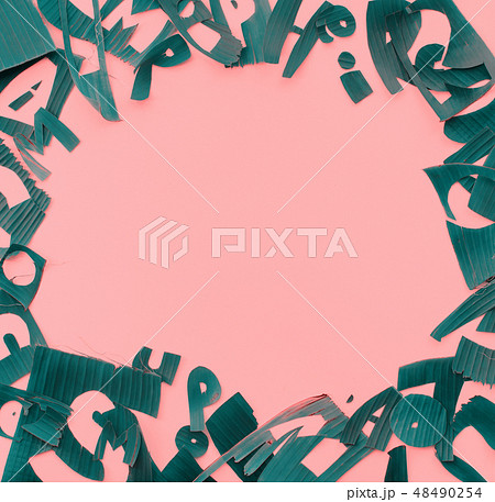 Copy space frame from letter green tropical leaves 48490254