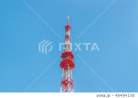 Telecommunication red tower with antennas 48494130