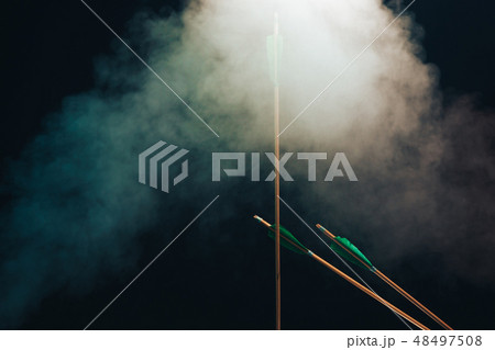 Five wood arrow. Beautiful smog background. Five wood arrow. Beautiful smog background. 48497508