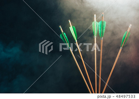 Five wood arrow. Beautiful smog background. Five wood arrow. Beautiful smog background. 48497533