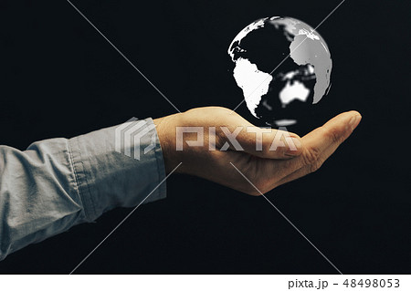 Protect our world in human hands and nebula dust. 48498053