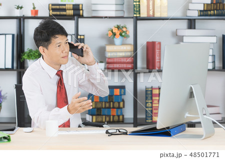 Asian business man at office Asian business man at office 48501771