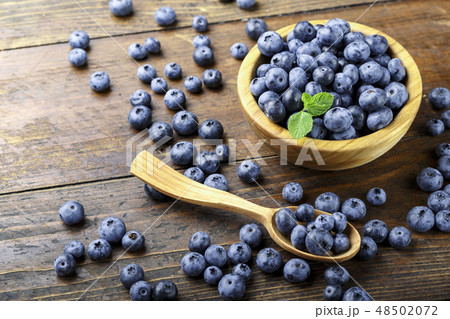 blueberries are scattered on the table blueberries are scattered on the table 48502072