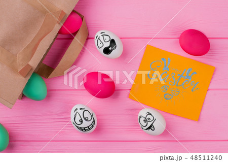 Easter greeting card and funny eggs. Easter greeting card and funny eggs. 48511240