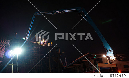 Construction crane truck working at night Construction crane truck working at night 48512939