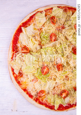 Caesar chicken breast and grated cheese lettuce Caesar chicken breast and grated cheese lettuce 48514285